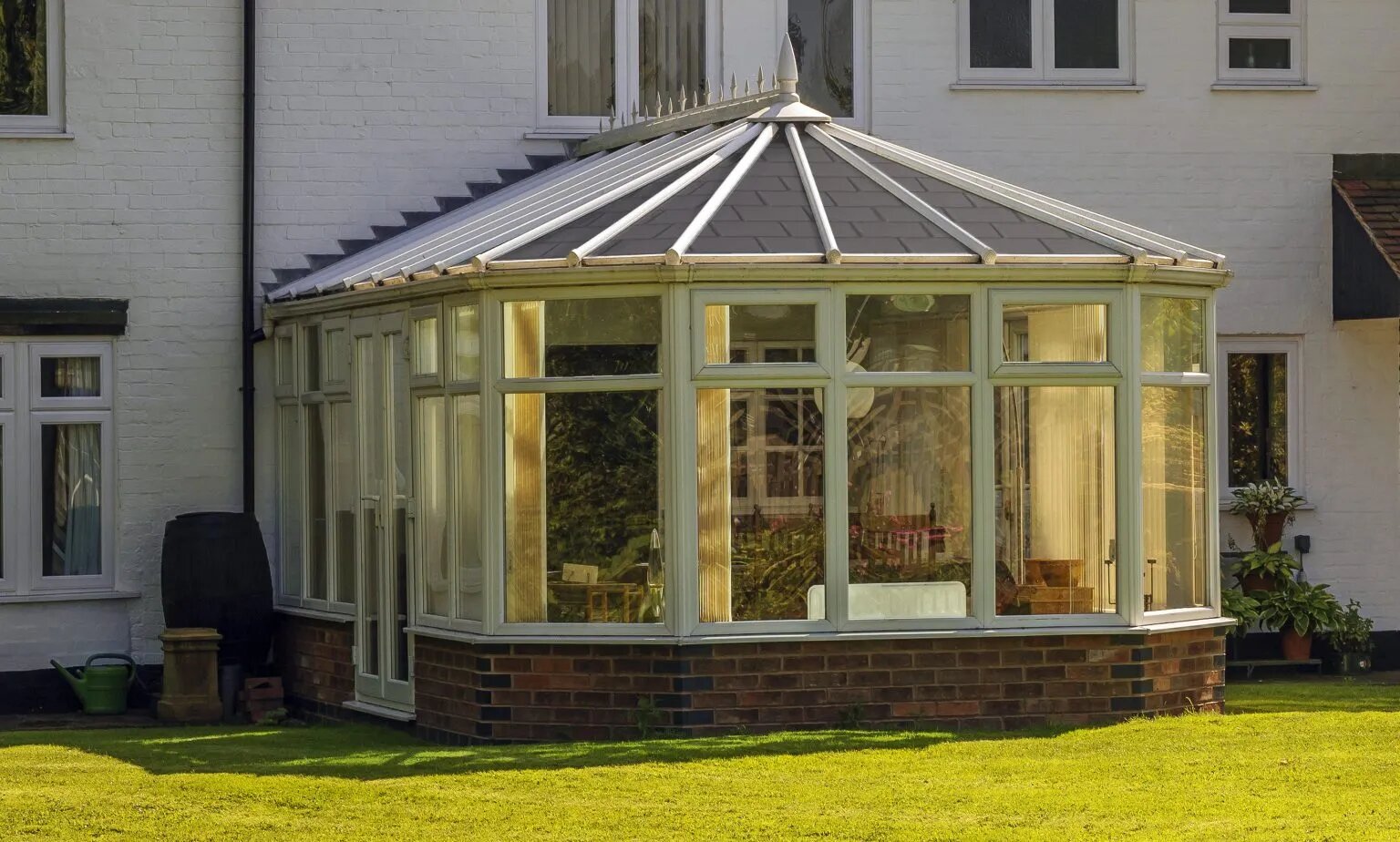 Elegant insulated conservatory attached to a house