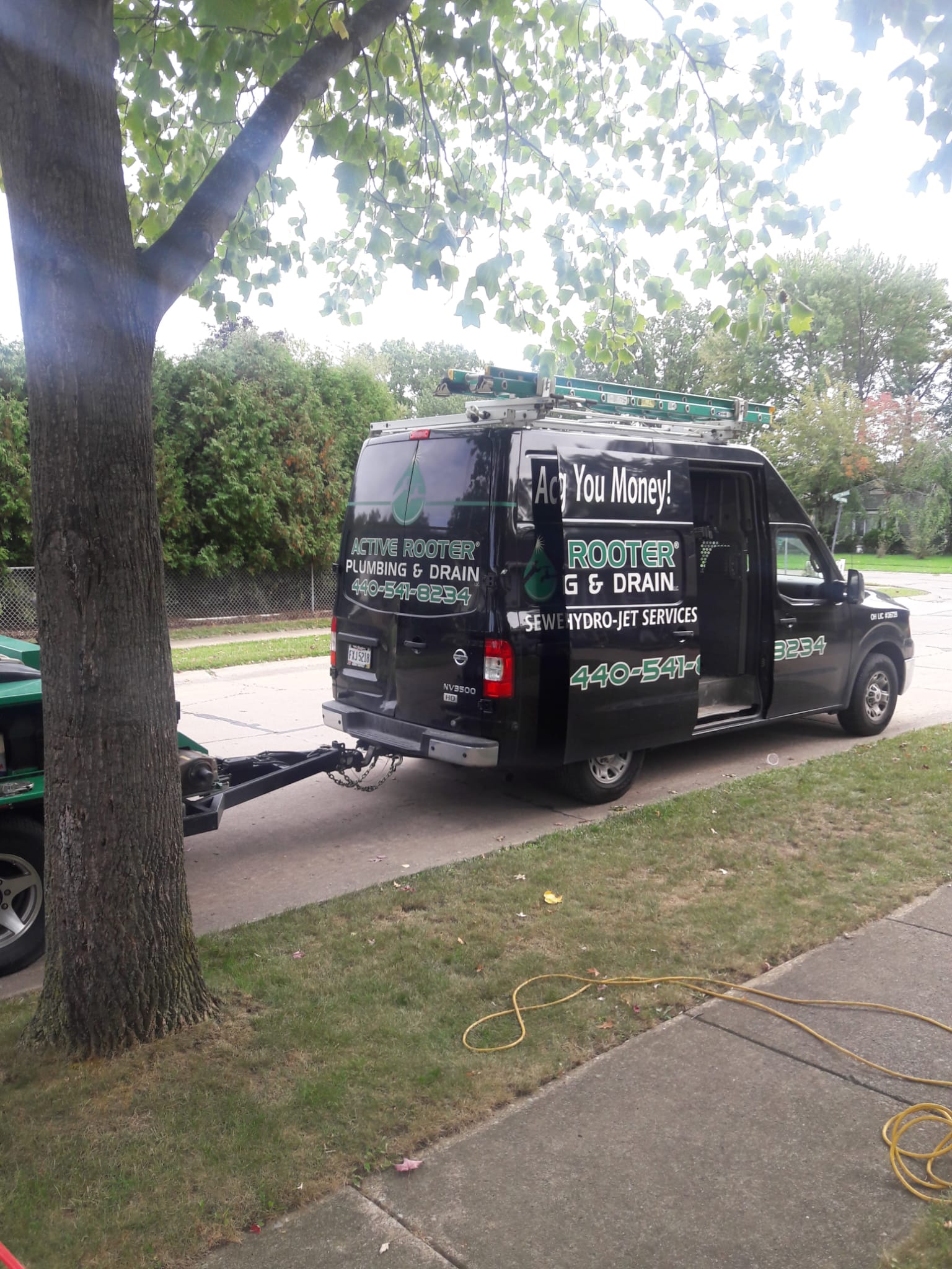 What are the benefits of hiring Active Rooter Plumbing & Drain Cleaning for sewer line cleaning in Elyria?